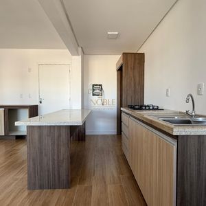 Apartamento com 80m², 2 dormitórios, 1 suíte, 1 vaga no Trade Center em Torres para Comprar