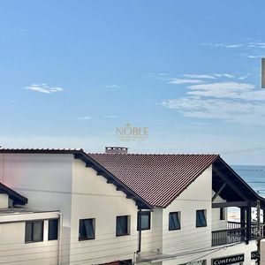 Apartamento com 185m², 4 dormitórios, 1 suíte, 2 vagas no Villa Tuchauah em Torres para Comprar