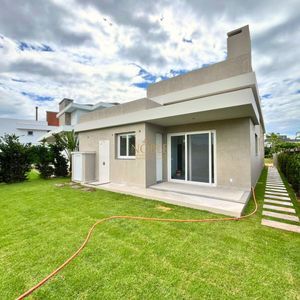 Casa de Condomínio com 180m², 4 dormitórios, 4 suítes, 2 vagas no Condomínio Ilhas Park em Torres para Comprar