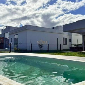 Casa de Condomínio com 207m², 3 dormitórios, 3 suítes, 2 vagas no Reserva das Águas em Torres para Comprar