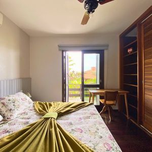 Casa com 518m², 5 dormitórios, 2 suítes, 2 vagas no bairro Praia Grande em Torres para Comprar