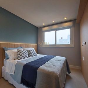 Apartamento com 90m², 2 dormitórios, 2 suítes, 2 vagas no Maui Residencial em Torres para Comprar