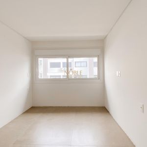 Apartamento com 83m², 2 dormitórios, 1 suíte, 2 vagas no Residencial Exclusive em Torres para Comprar