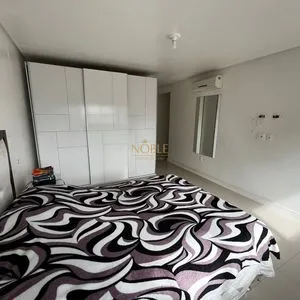 Apartamento com 77m², 2 dormitórios, 1 suíte, 1 vaga no Piazza em Torres para Comprar