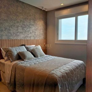 Apartamento com 102m², 3 dormitórios, 1 suíte, 2 vagas no Maui Residencial em Torres para Comprar