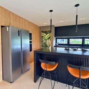 Casa de Condomínio com 390m², 5 dormitórios, 5 suítes, 3 vagas no Condomínio Ilhas Park em Torres para Comprar