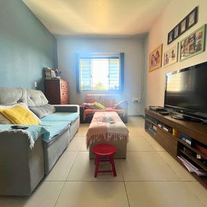 Casa, 3 dormitórios, 1 suíte, 2 vagas no bairro Igra Sul em Torres para Comprar