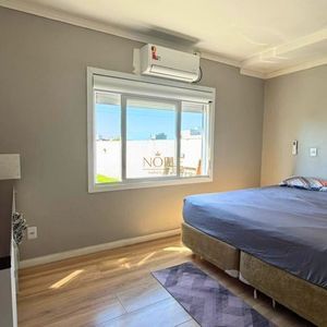 Casa com 120m², 3 dormitórios, 1 suíte, 2 vagas no bairro Loteamento Caravelle em Passo de Torres para Comprar