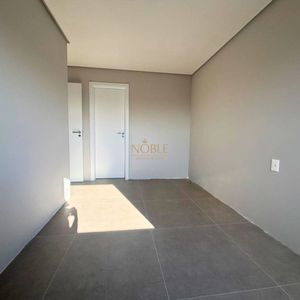 Apartamento com 70m², 2 dormitórios, 1 suíte, 1 vaga no Topazio em Torres para Comprar
