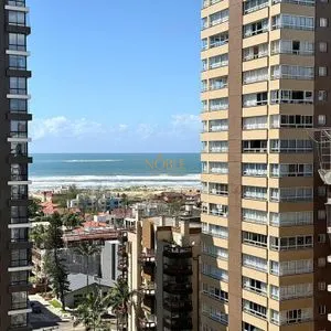 Apartamento com 83m², 2 dormitórios, 1 suíte, 2 vagas no Mirage em Torres para Comprar