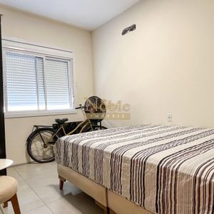 Geminado com 103m², 3 dormitórios, 1 suíte, 2 vagas no bairro Morada das Palmeiras em Torres para Comprar