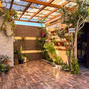 Casa com 300m², 3 dormitórios, 3 suítes, 4 vagas no bairro Centro em Torres para Comprar