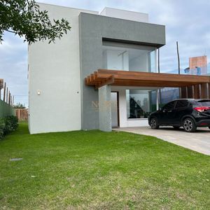 Casa de Condomínio com 234m², 5 dormitórios, 3 suítes, 2 vagas no Condomínio Ilhas Park em Torres para Comprar