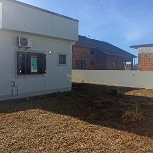 Casa com 76m², 2 dormitórios, 1 suíte, 1 vaga no bairro Bella Torres em Passo de Torres para Comprar