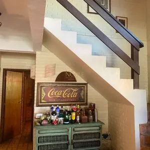 Casa com 247m², 5 dormitórios, 3 suítes, 3 vagas no bairro Praia Grande em Torres para Comprar