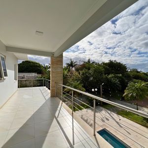 Casa com 600m², 4 dormitórios, 1 suíte, 4 vagas no bairro Igra Norte em Torres para Comprar