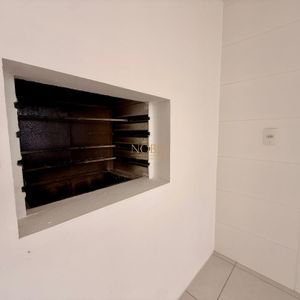 Apartamento com 59m², 2 dormitórios, 1 suíte, 1 vaga no Residencial Jardim Europa em Torres para Comprar