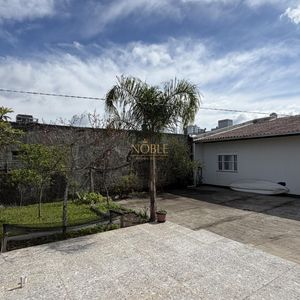 Casa com 136m², 3 dormitórios, 1 suíte, 2 vagas no bairro Praia da Cal em Torres para Comprar