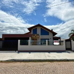Casa com 215m², 3 dormitórios, 1 suíte, 2 vagas no bairro Morada das Palmeiras em Torres para Comprar
