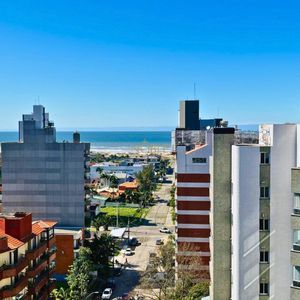 Apartamento com 88m², 3 dormitórios, 3 suítes, 2 vagas no Perito Moreno em Torres para Comprar