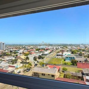 Apartamento com 70m², 2 dormitórios, 1 suíte, 1 vaga no Topazio em Torres para Comprar