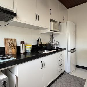 Casa com 136m², 3 dormitórios, 1 suíte, 2 vagas no bairro Praia da Cal em Torres para Comprar