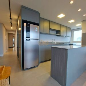 Apartamento com 102m², 3 dormitórios, 1 suíte, 2 vagas no Maui Residencial em Torres para Comprar