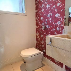 Casa com 400m², 5 dormitórios, 1 suíte, 4 vagas no bairro Stan em Torres para Comprar