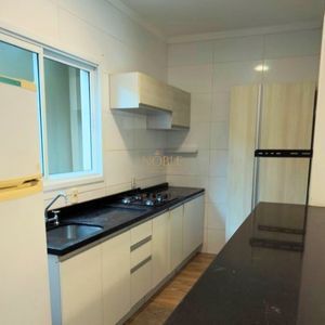 Sobrado com 127m², 3 dormitórios, 1 suíte, 1 vaga no Ilhas Travertino em Torres para Comprar