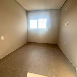 Apartamento com 70m², 2 dormitórios, 1 suíte, 1 vaga no Topazio em Torres para Comprar