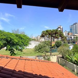 Casa com 193m², 3 dormitórios, 1 suíte, 3 vagas no bairro Praia Grande em Torres para Comprar