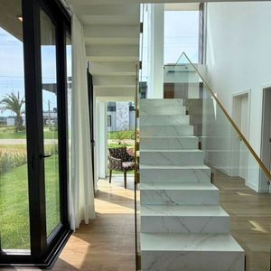 Casa com 258m², 4 dormitórios, 4 suítes, 2 vagas no Reserva das Águas em Torres para Comprar