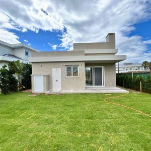 Casa de Condomínio com 180m², 4 dormitórios, 4 suítes, 2 vagas no Condomínio Ilhas Park em Torres para Comprar