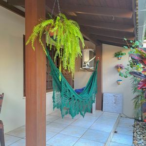 Sobrado com 330m², 3 dormitórios, 1 suíte, 5 vagas no bairro Centenário em Torres para Comprar