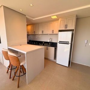 Apartamento com 72m², 2 dormitórios, 1 suíte, 1 vaga no Topazio em Torres para Comprar