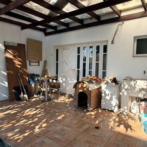 Casa com 400m², 5 dormitórios, 1 suíte, 4 vagas no bairro Stan em Torres para Comprar