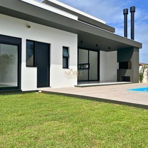 Casa com 288m², 4 dormitórios, 4 suítes, 4 vagas no bairro Bella Torres em Passo de Torres para Comprar