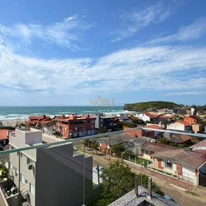 Apartamento com 101m², 2 dormitórios, 2 suítes, 2 vagas no Belize em Torres para Comprar