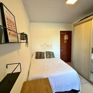 Casa com 108m², 2 dormitórios, 2 vagas no bairro Capão do Cravo em Passo de Torres para Comprar
