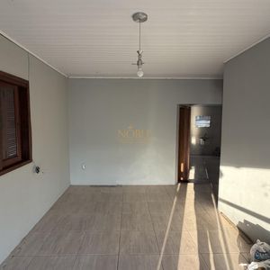 Casa com 100m², 2 dormitórios, 1 suíte no bairro Vila São João em Torres para Comprar