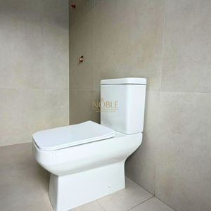 Casa com 284m², 4 dormitórios, 1 suíte, 2 vagas no bairro Igra Sul em Torres para Comprar