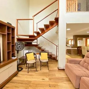 Casa com 272m², 4 dormitórios, 1 suíte, 3 vagas no bairro Igra Norte em Torres para Comprar