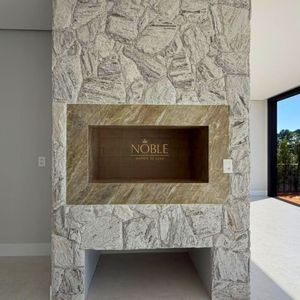 Casa com 335m², 4 dormitórios, 4 suítes, 2 vagas no Reserva das Águas em Torres para Comprar