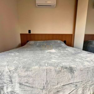 Apartamento com 64m², 2 dormitórios, 1 suíte, 1 vaga no Aston em Torres para Comprar