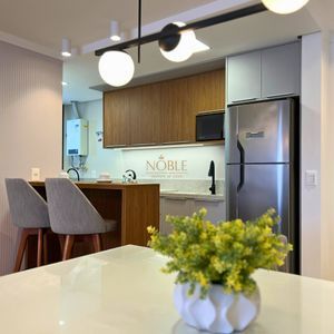 Apartamento com 71m², 2 dormitórios, 1 suíte, 2 vagas no Residencial DI Capri em Torres para Comprar