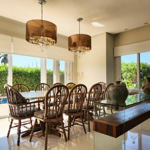 Casa de Condomínio com 440m², 5 dormitórios, 5 suítes, 2 vagas no Ocean Side em Torres para Comprar