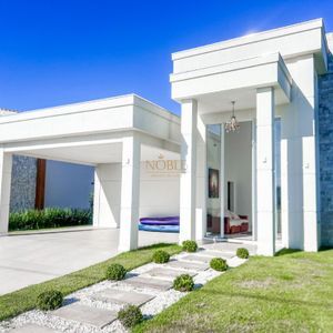 Casa de Condomínio com 170m², 3 dormitórios, 1 suíte, 2 vagas no Reserva das Águas em Torres para Comprar