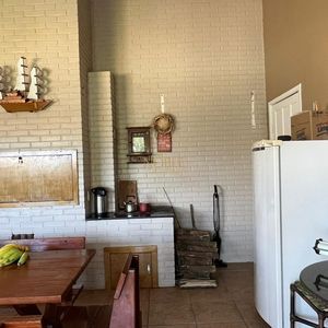 Sobrado com 290m², 4 dormitórios, 1 suíte, 2 vagas no bairro Igra Norte em Torres para Comprar
