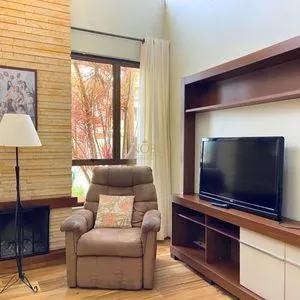 Casa com 272m², 4 dormitórios, 1 suíte, 3 vagas no bairro Igra Norte em Torres para Comprar