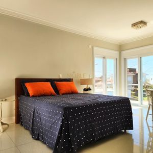 Casa de Condomínio com 440m², 5 dormitórios, 5 suítes, 2 vagas no Ocean Side em Torres para Comprar